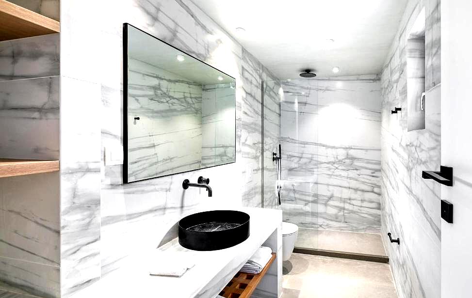 modern marble bathroom with walk in shower