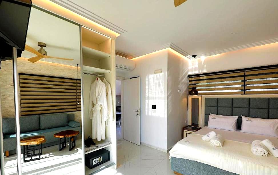 modern suite with robe in closet