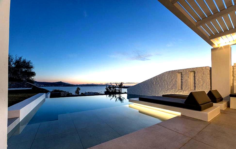 nighttime pool view with lights