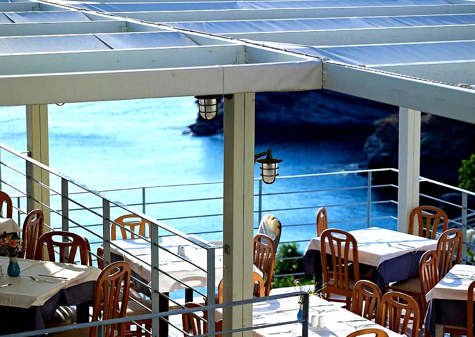 open air restaurant with sea view and elegant seating