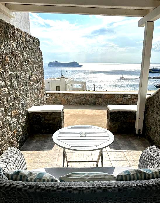 outdoor lounge area with sea view