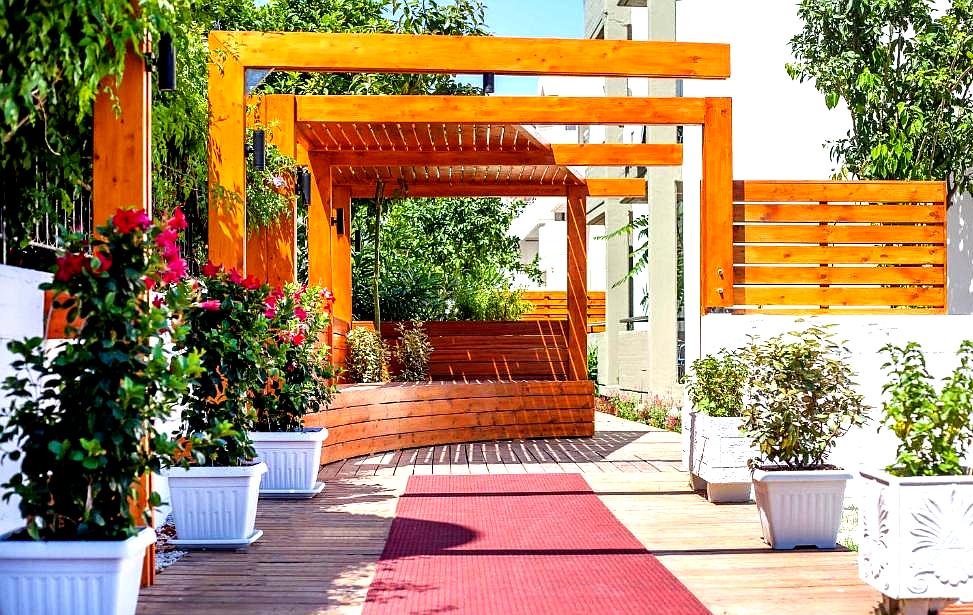 outdoor patio with wooden pergola