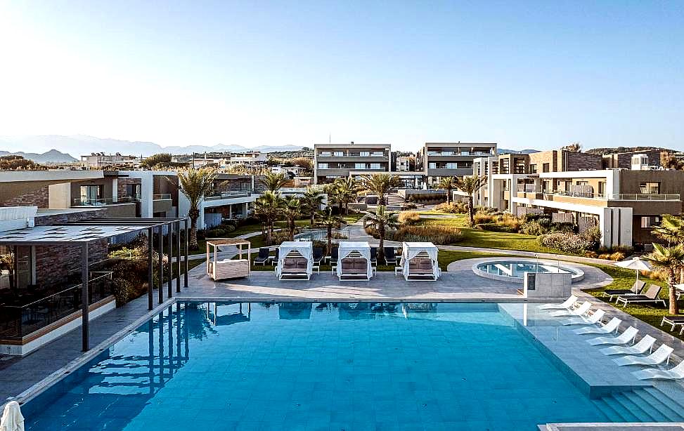 outdoor pool area with private cabanas