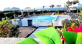 outdoor pool area with sea view