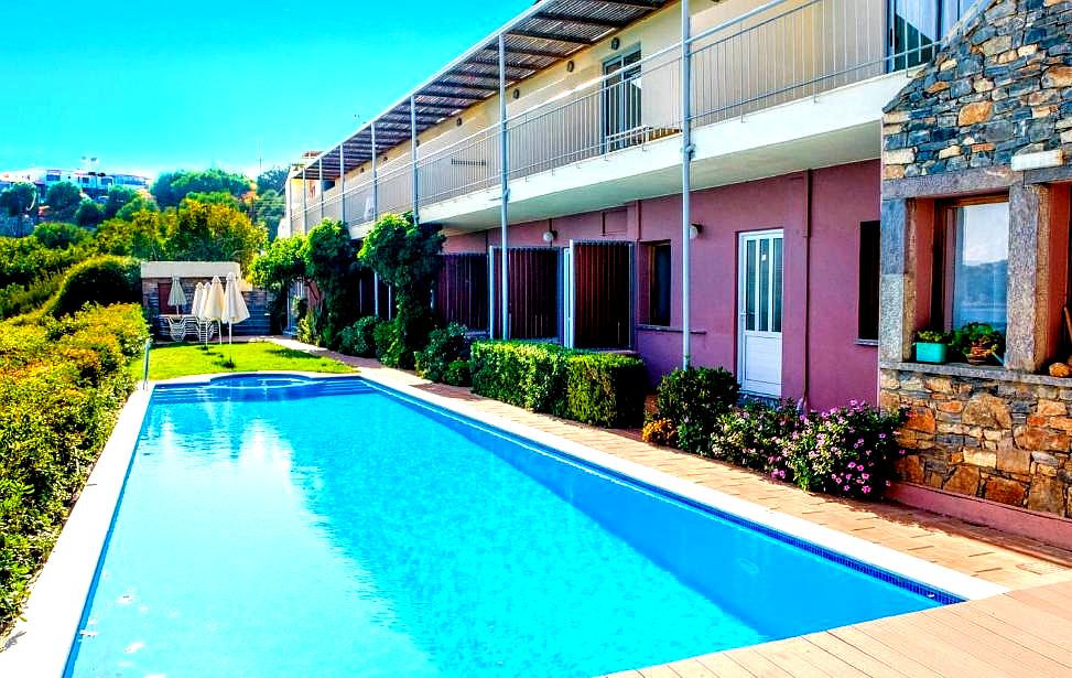 outdoor pool with garden area