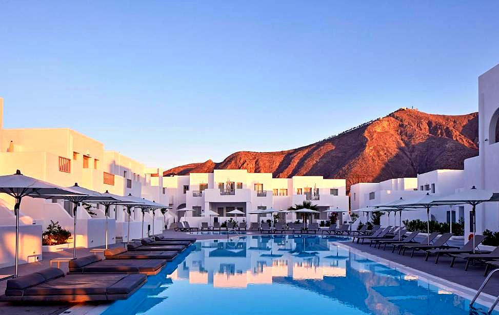 outdoor swimming pool during sunset