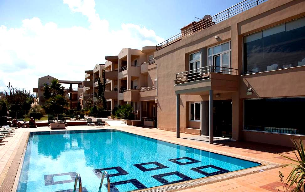 outdoor swimming pool with apartment view