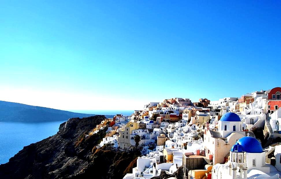 panoramic view of whitewashed village and sea