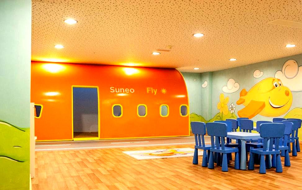 playful kids area with airplane themed decor