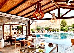 poolside lounge with rustic decor and lighting