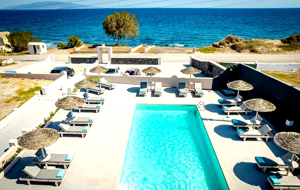 poolside view with sea backdrop