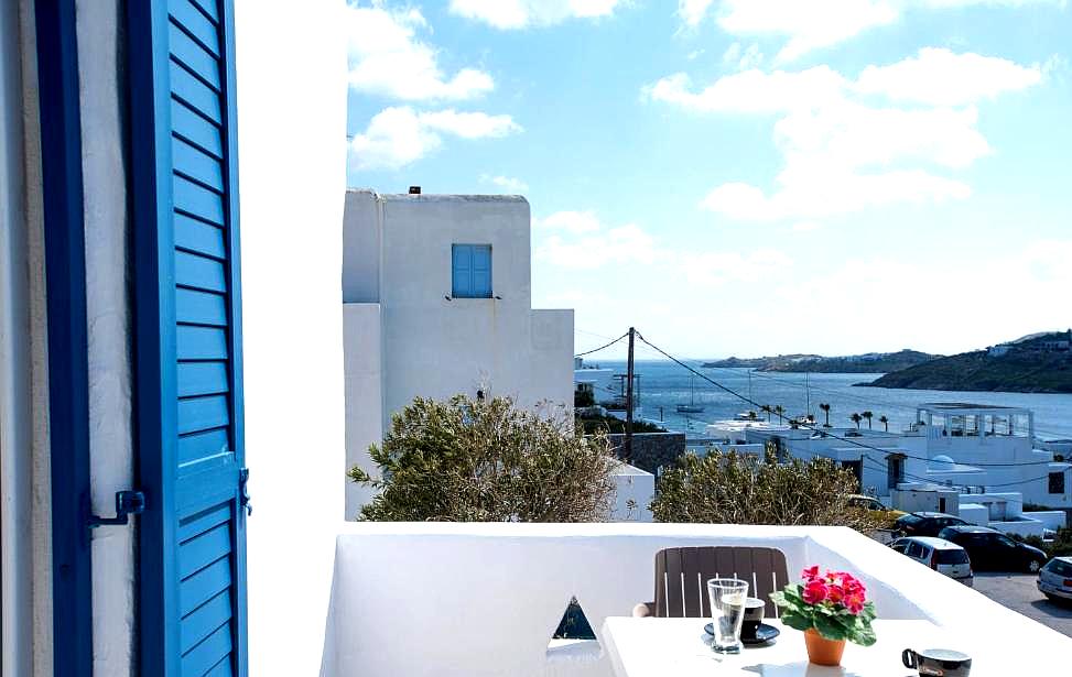 private balcony with sea view and cozy seating