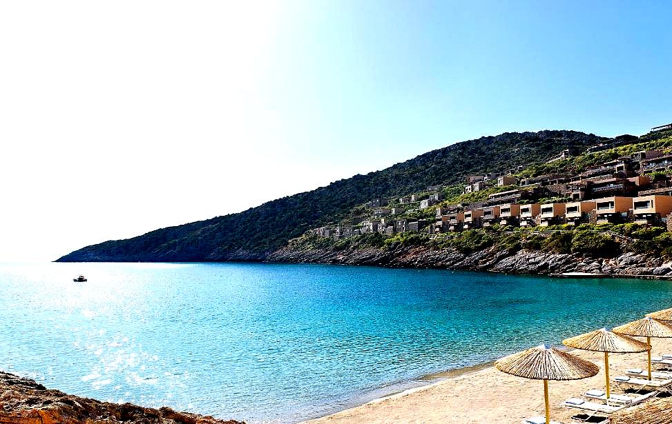 private beach with sea view and sunbeds