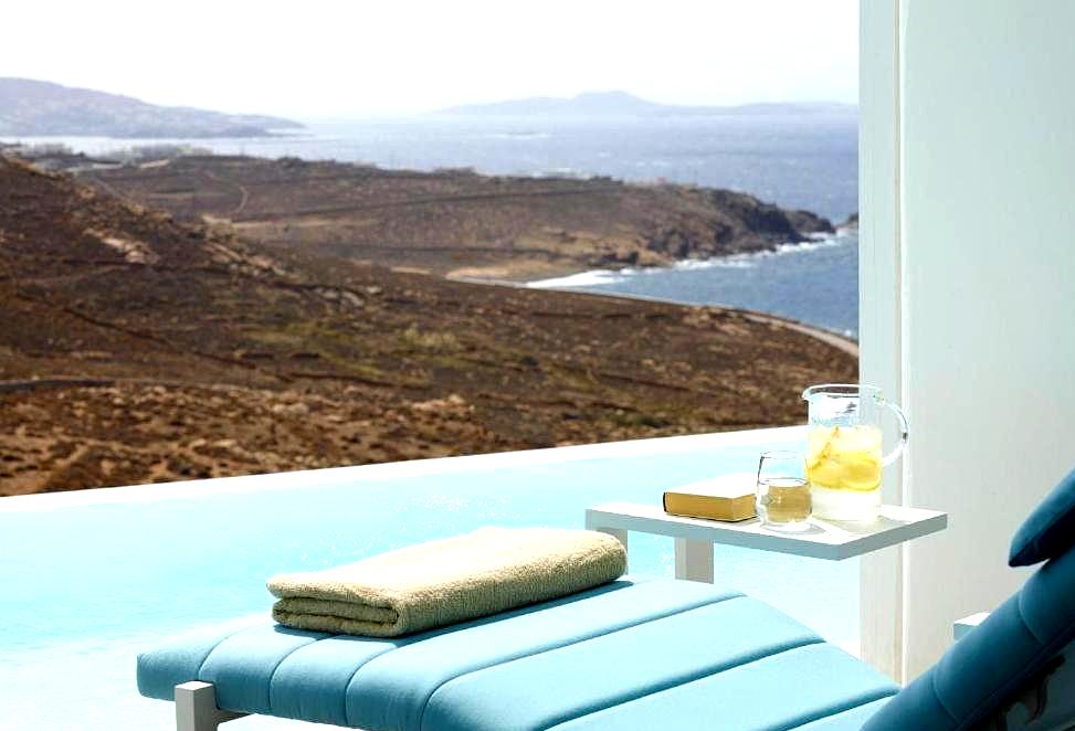 private lounge chair with poolside sea view