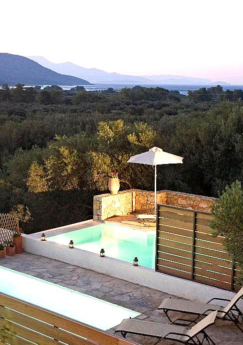 private swimming pool with umbrella and mountain view