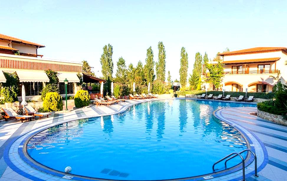 resort style pool with loungers