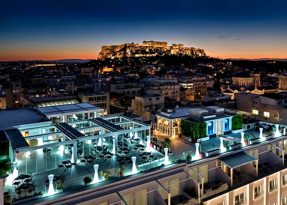 rooftop dining with acropolis view at night