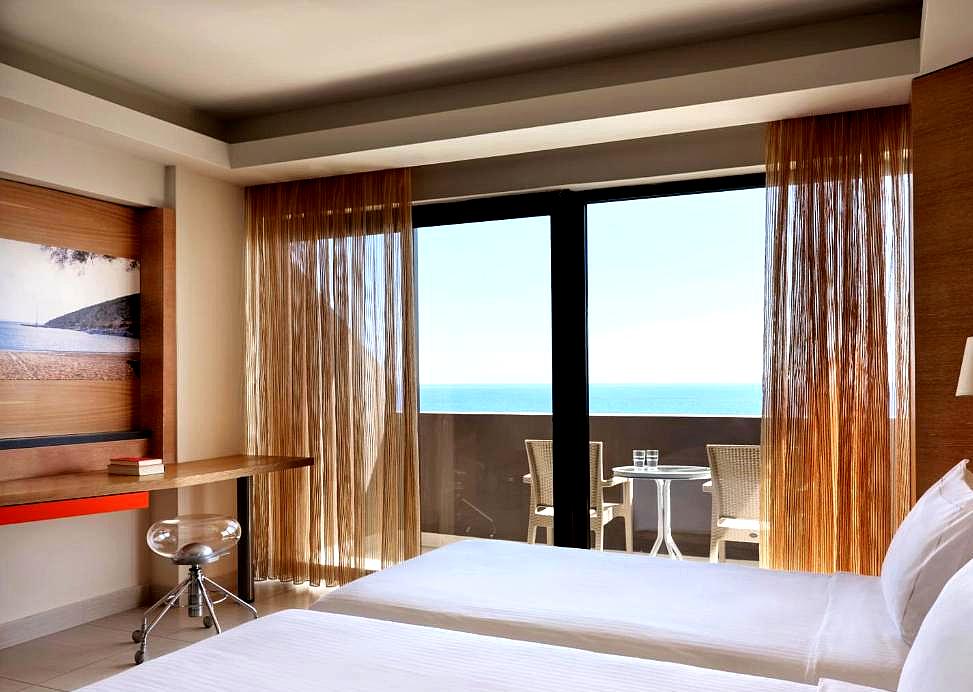 sea view room with twin beds and balcony