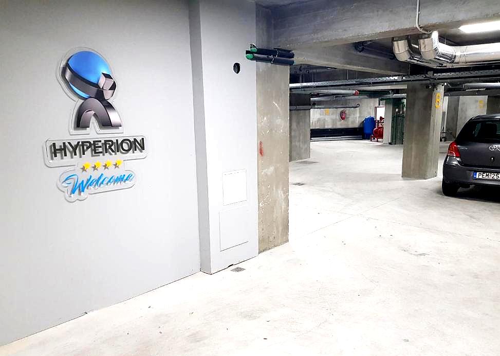 secure underground parking with hotel signage