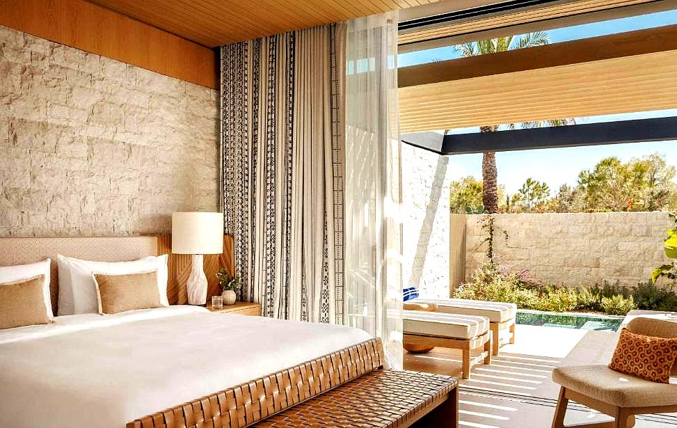 serene bedroom with direct access to private pool