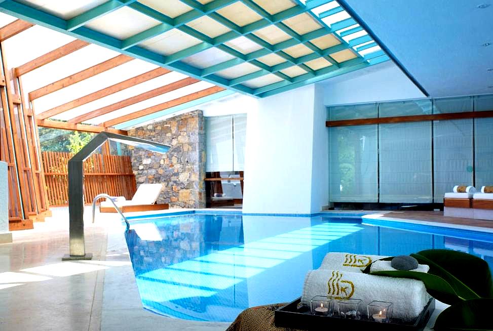 serene indoor pool with modern design and natural lighting