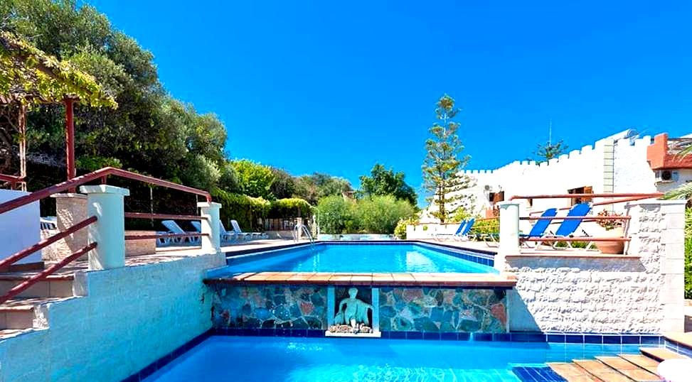 serene pool area with loungers and sunny weather