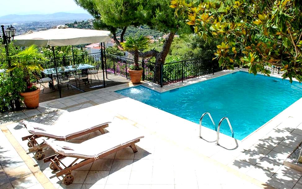 serene poolside area with garden view