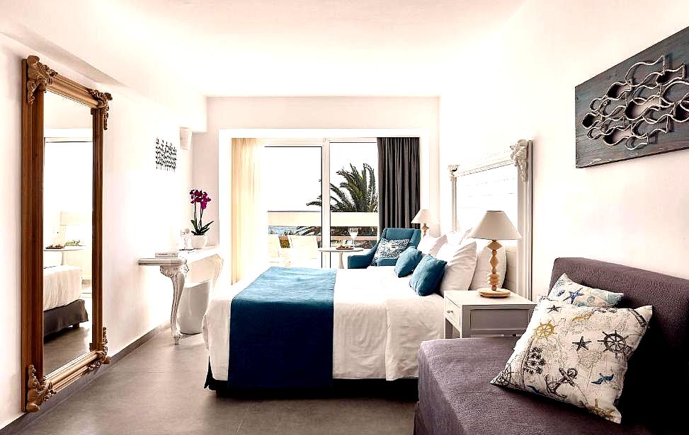 spacious suite with balcony and sea view