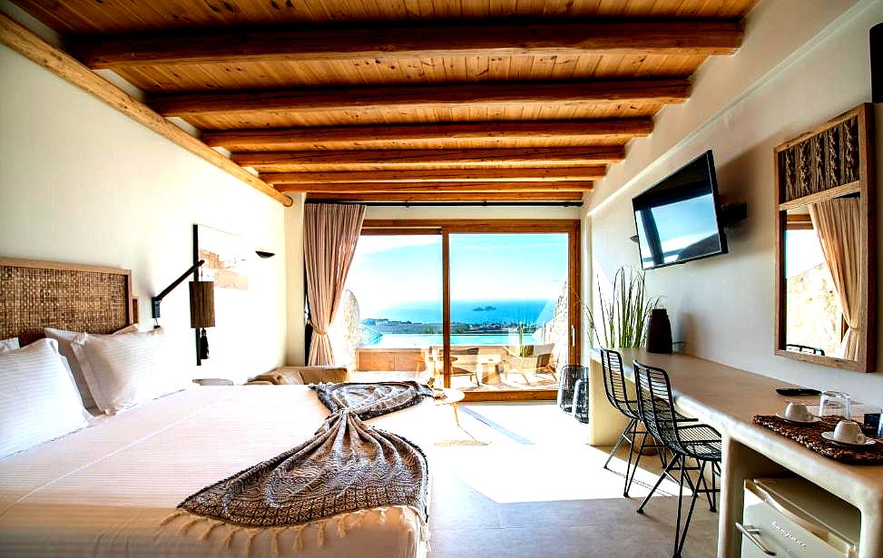 spacious suite with sea view and rustic decor