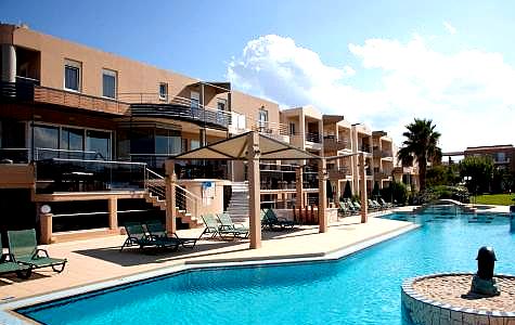 spacious swimming pool with modern buildings