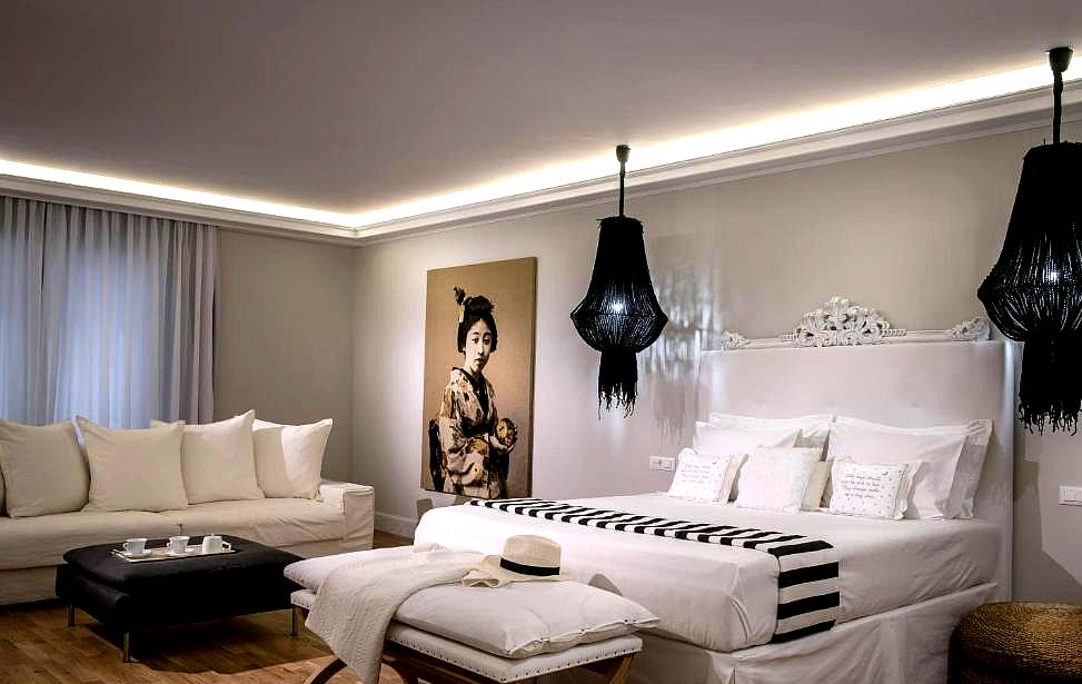 stylish bedroom with modern decor and striking black accents