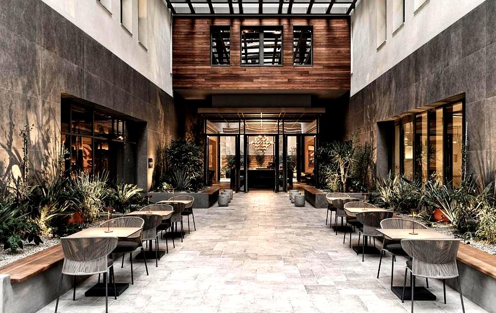 stylish indoor courtyard with seating and natural lighting