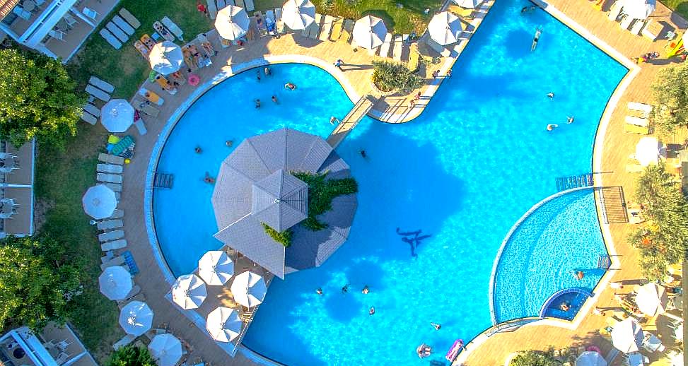 top view of pool with sun umbrellas