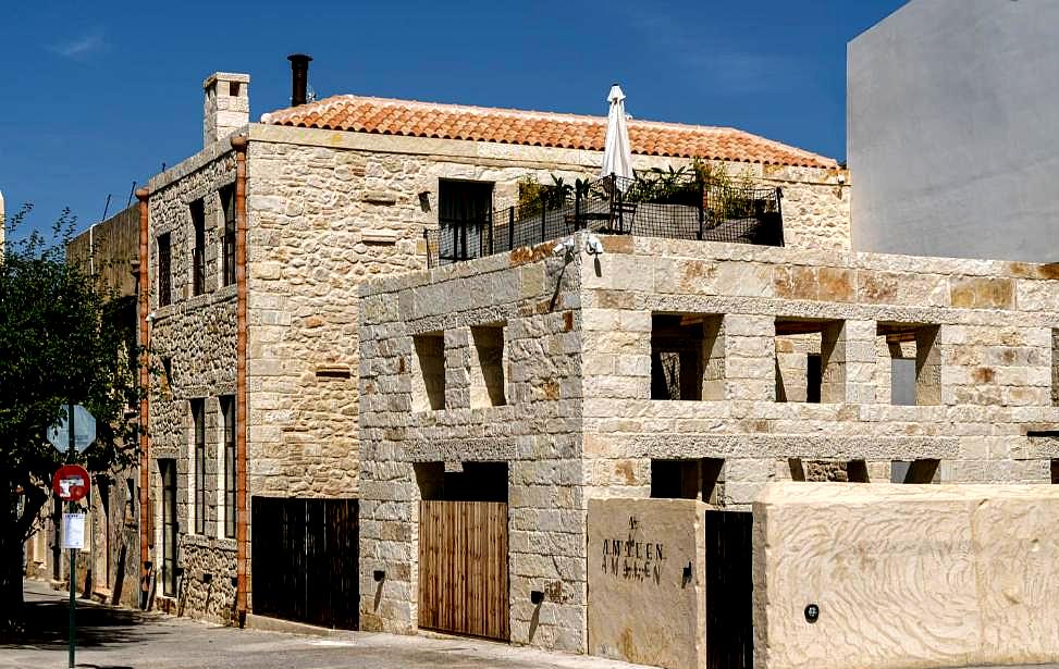 traditional stone exterior of hotel with modern touches